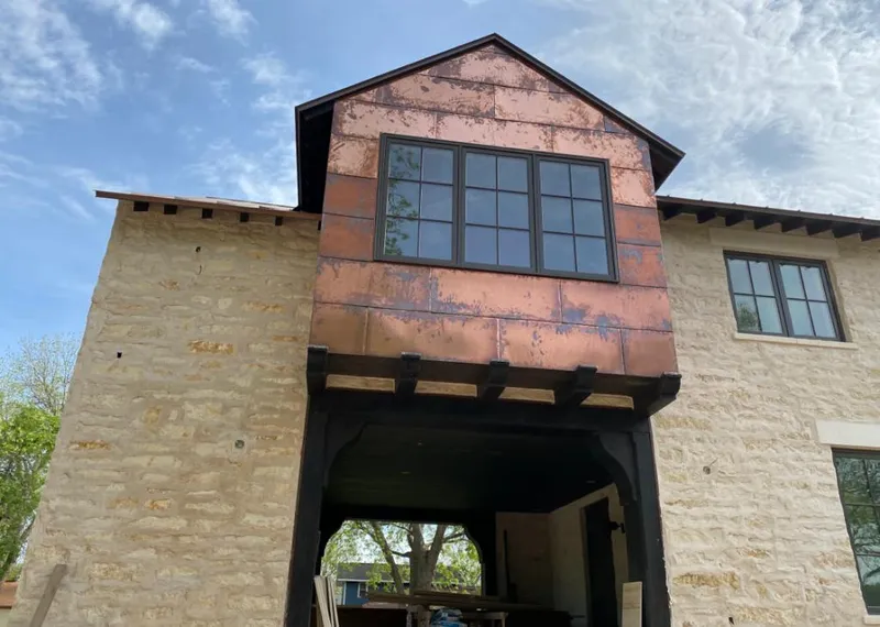 Copper metal panel facade on a stone building for Metal Roof Coating in Pleasanton